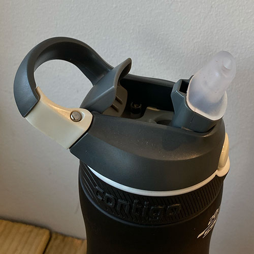 side view of the black water bottle cap only with spout open